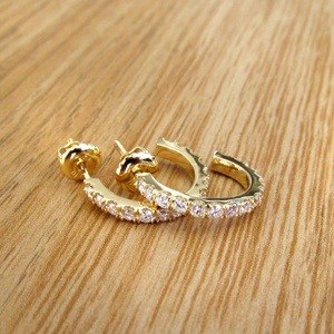 Realistic picture of 0.60 Carat Round Diamond Half-Hoop Earrings in 14K Gold