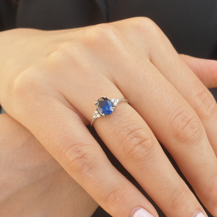 Realistic picture of Royal Blue Sapphire & Diamond Ring in 14k Gold