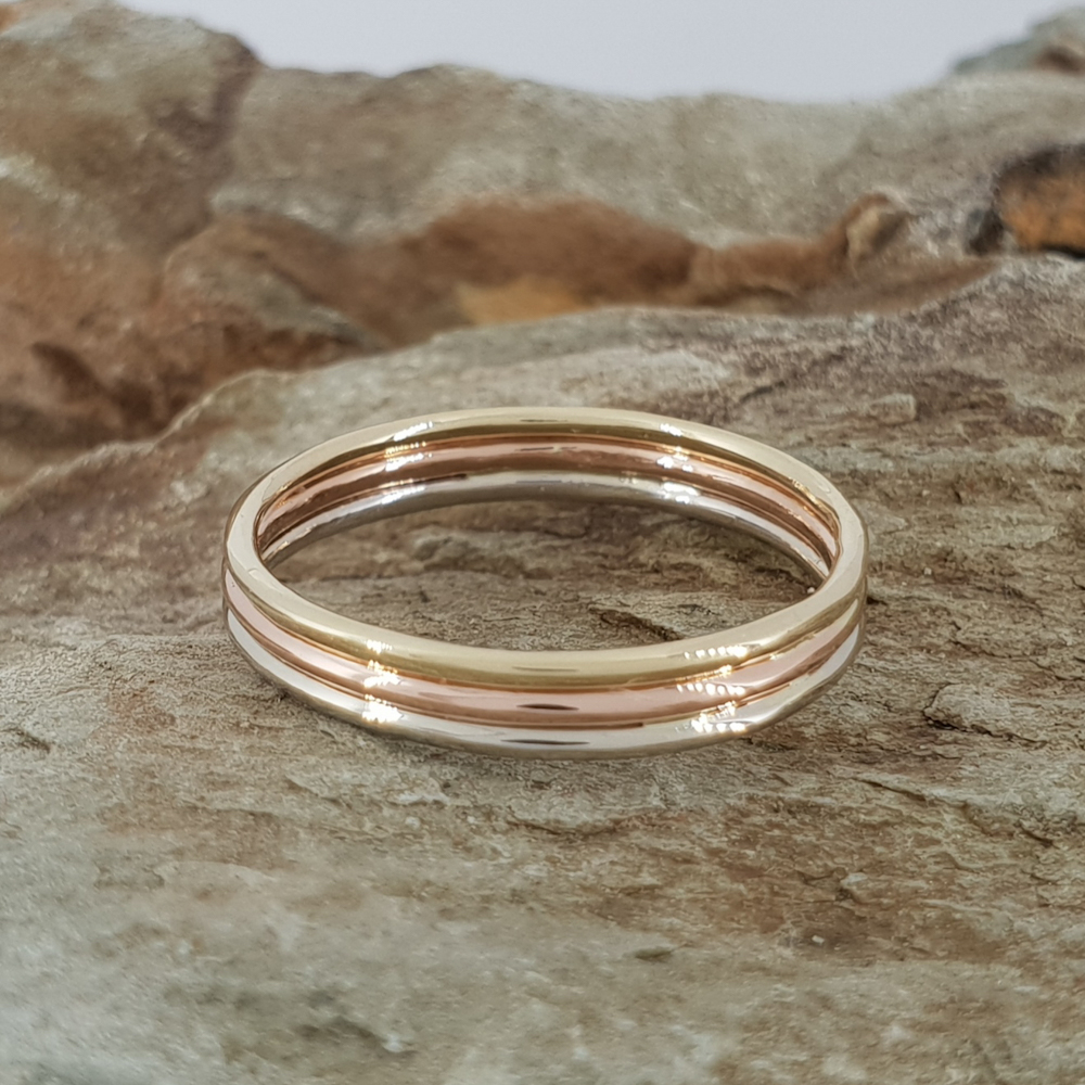 Realistic picture of   14K Gold Tri-Color Wedding Band